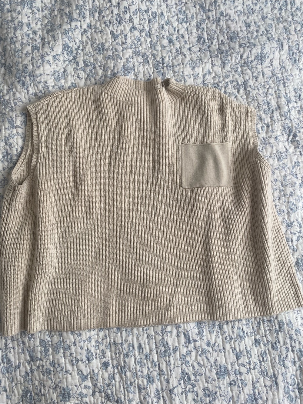 Sleeveless Mock Neck Ribbed Sweater Vest in Cream